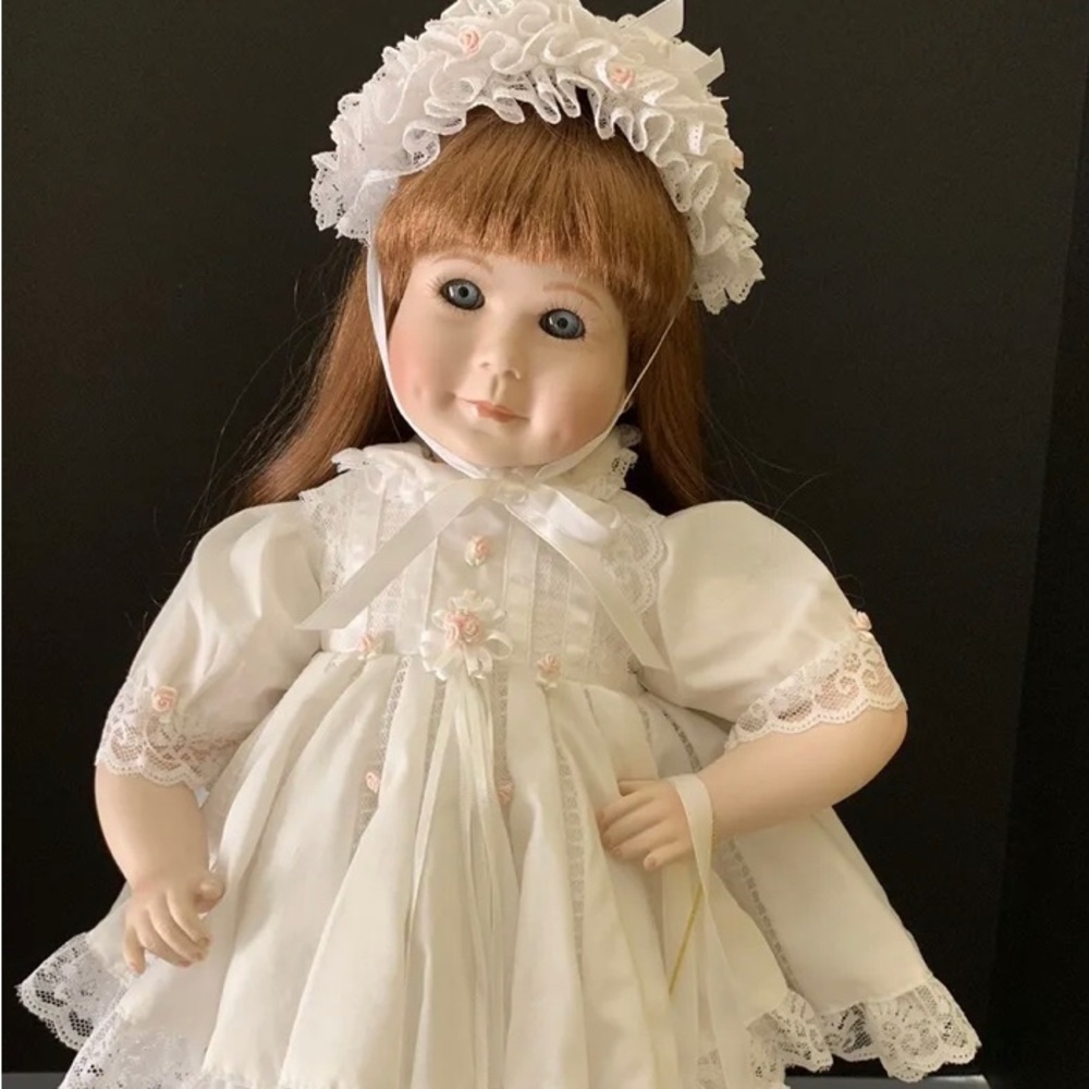 Beautiful bran new on box authentic porcelain doll!